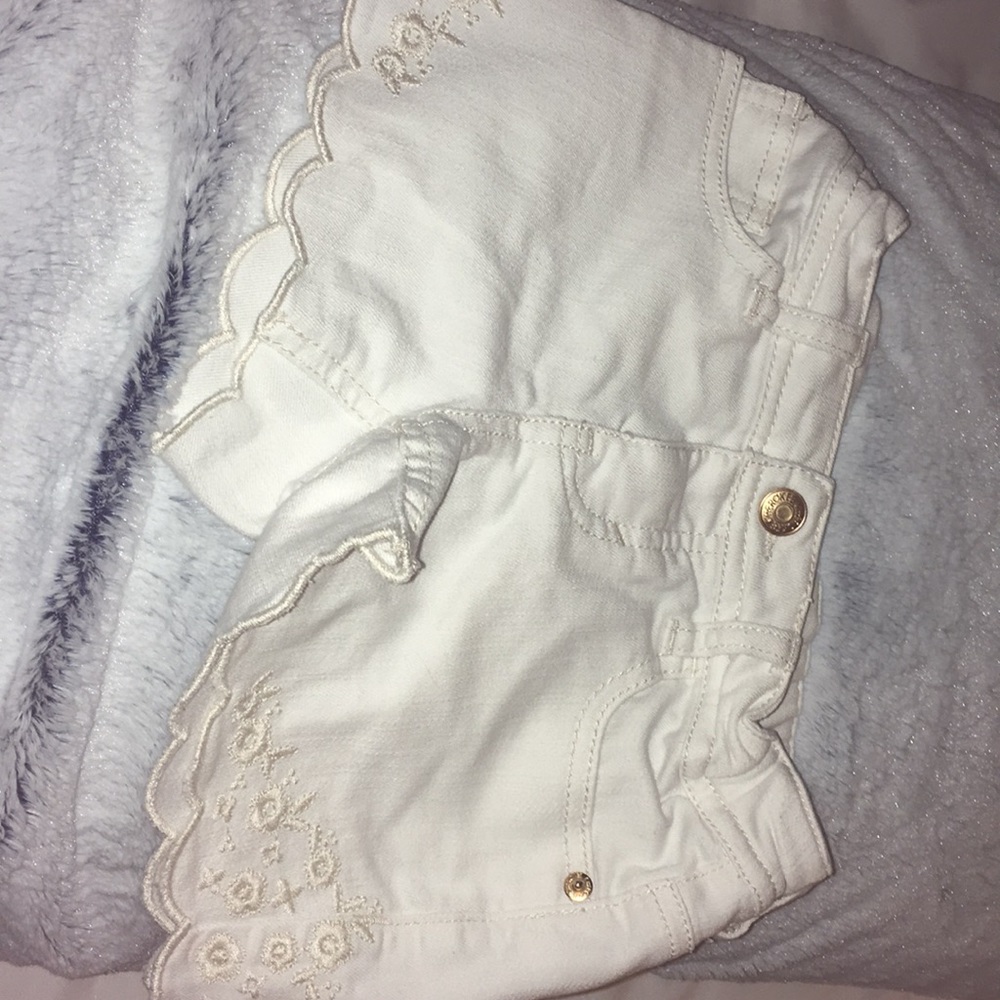 Girls white jean shorts.